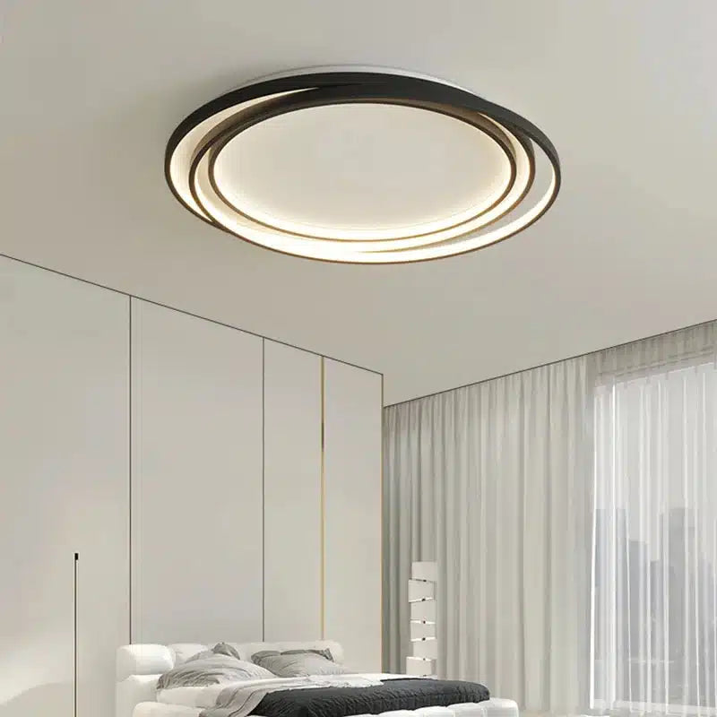 Plafonnier LED ultra fin au design moderne avec formes rondes entrelacées