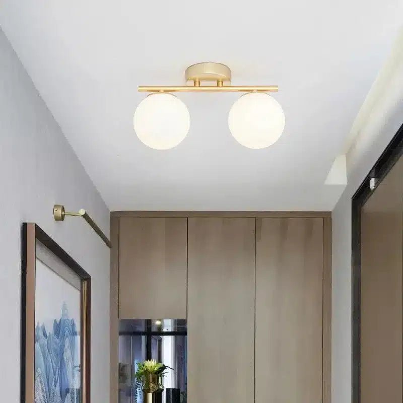 Plafonnier LED en verre nordique en duo ou trio boules blanches pour Salon - Luminenza - Doré