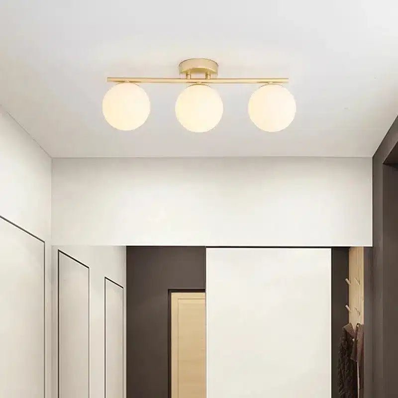 Plafonnier LED en verre nordique en duo ou trio boules blanches pour Salon - Luminenza - Doré